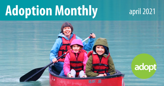 Adoption Monthly April: A mother paddles in a boat with her two children.